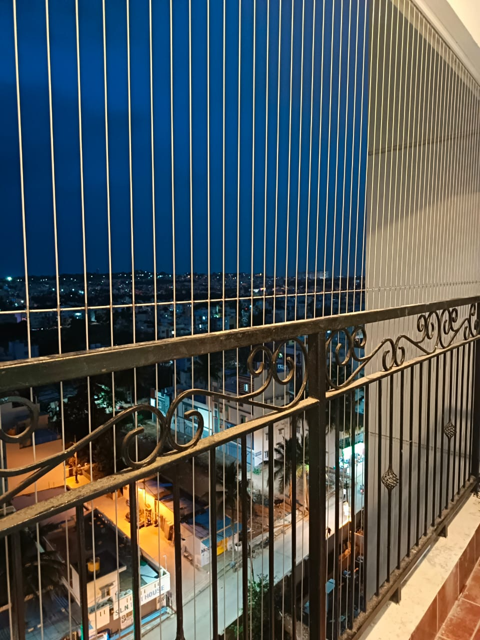 High-rise balcony bird net installation